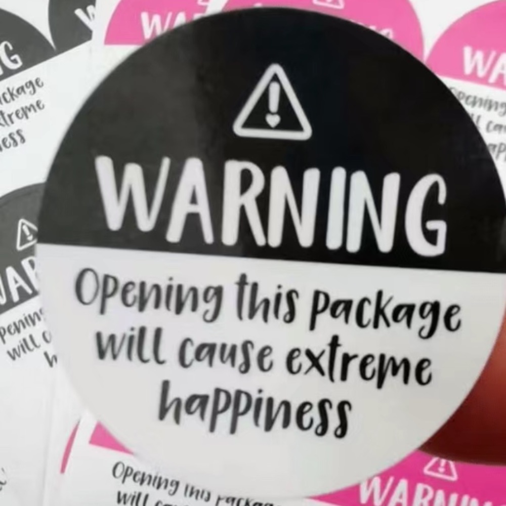 120 “Warning -Opening this package…” BLACK 1.5” Stickers